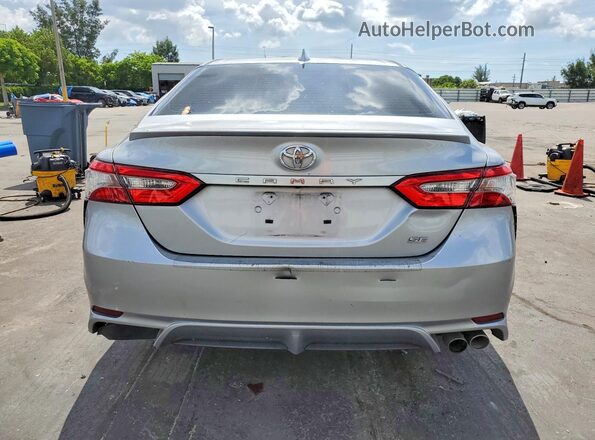 4T1B11HK9KU690727 2019 TOYOTA CAMRY Silver წინა სალონის ხედი