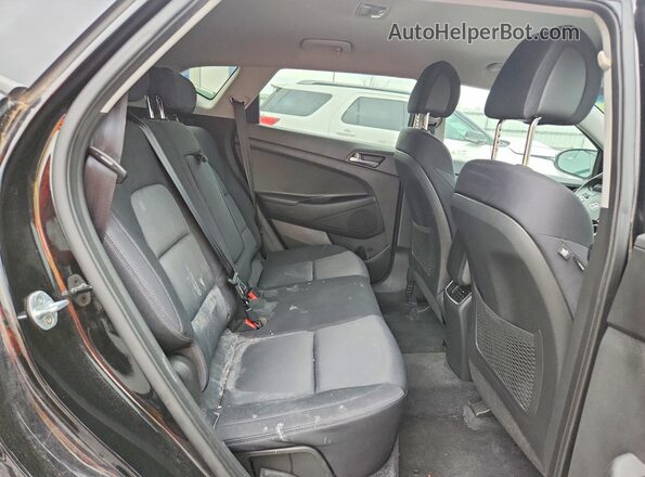 KM8J3CA23HU576503 2017 HYUNDAI TUCSON Black Rear interior view