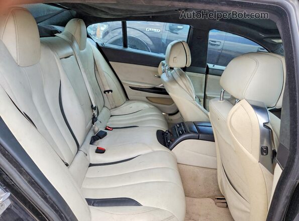WBA6D6C5XGGF94767 2016 BMW OTHER Black Vista interior trasera