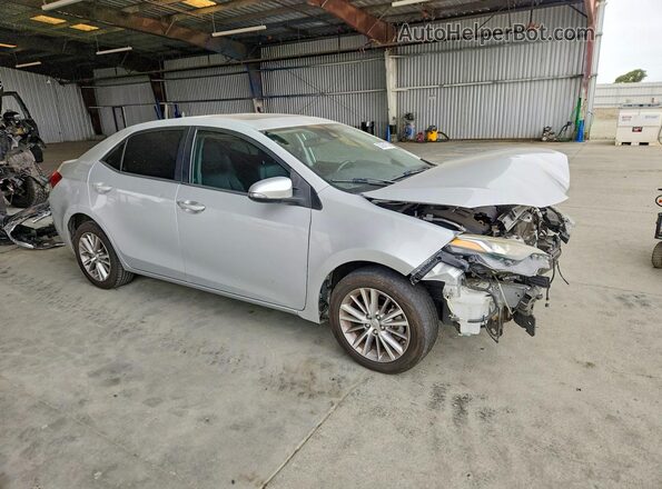 2T1BURHE7JC029617 2018 TOYOTA COROLLA Silver Вид спереду