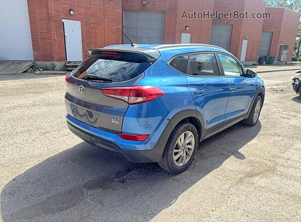 KM8J3CA42GU083136 2016 HYUNDAI TUCSON Blue Vista frontal