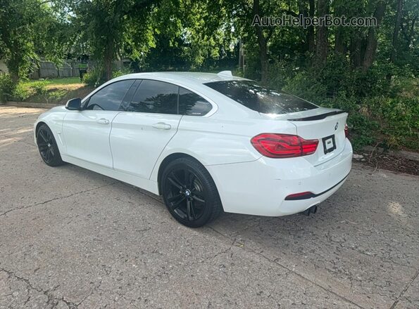 WBA4J1C53JBA30076 2018 BMW OTHER White Delantero derecho