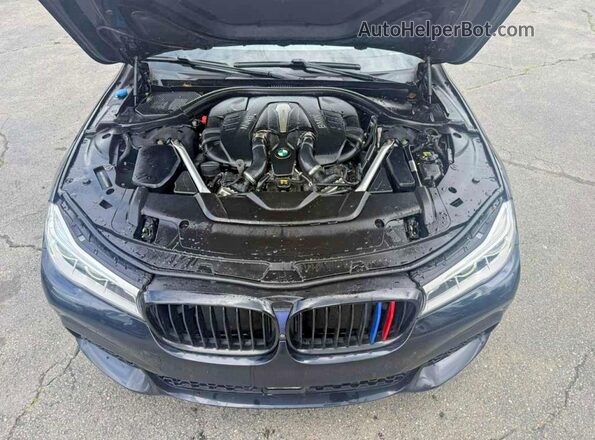 WBA7F2C55JB238705 2018 BMW 7 SERIES Black უკანა ხედი