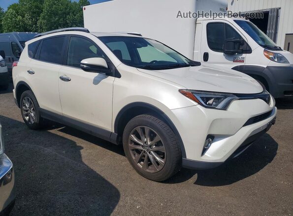 JTMDFREVXGJ054886 2016 TOYOTA RAV4 White 