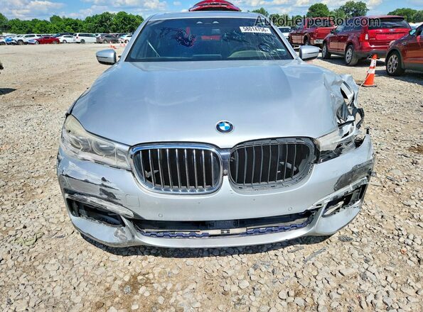 WBA7F2C55GG419198 2016 BMW 7 SERIES Silver Вид ззаду