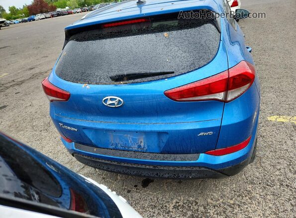 KM8J3CA4XGU228648 2016 HYUNDAI TUCSON Blue 