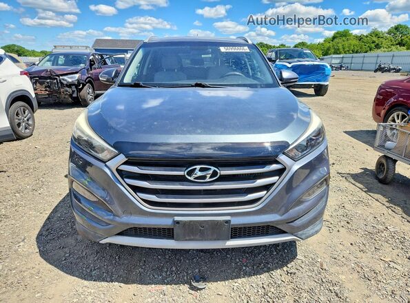KM8J3CA21HU288141 2017 HYUNDAI TUCSON Серый 