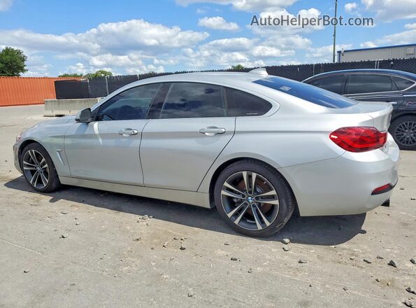 WBA4J5C04LCD24580 2020 BMW OTHER Серебряный 