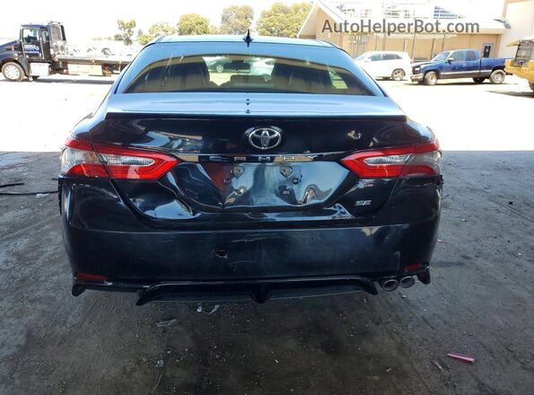 4T1G11AK7LU879233 2020 TOYOTA CAMRY Black Widok wnętrza z przodu