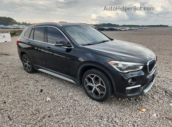WBXHT3C32H5F74315 2017 BMW X1 Black Դիմացի տեսք