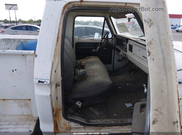 F10YLU21385       1974 FORD F100 Белый Вид салона спереди