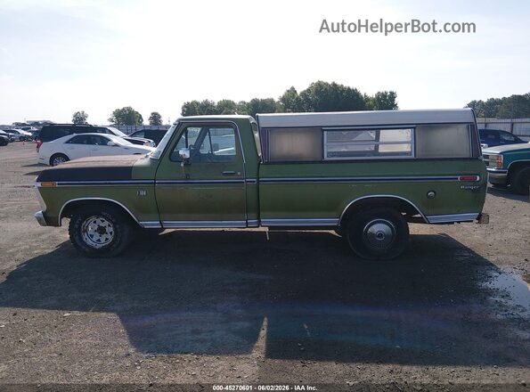 F10YUS22104       1973 FORD F100 Зеленый Вид задней части салона