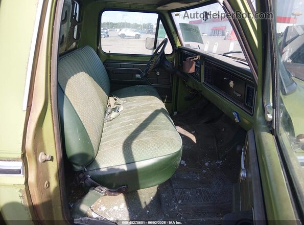 F10YUS22104       1973 FORD F100 Зеленый Вид салона спереди