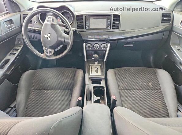 JA32U2FU2HU003486 2017 MITSUBISHI LANCER Серебряный Вид панели приборов