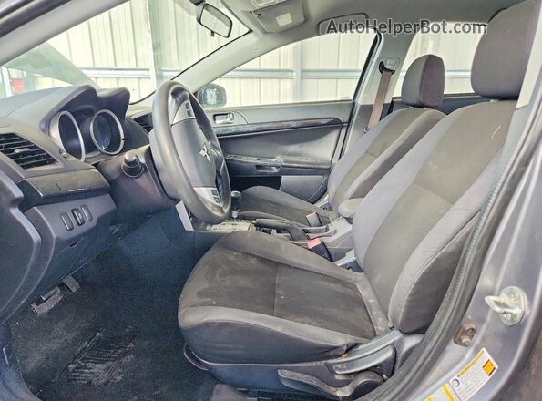 JA32U2FU2HU003486 2017 MITSUBISHI LANCER Серебряный Вид салона спереди