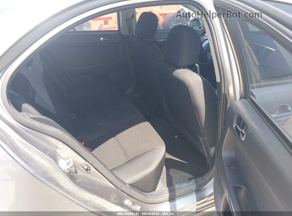 JA32U2FU7GU012506 2016 MITSUBISHI LANCER Silver VIN կոդի պիտակի տեսք
