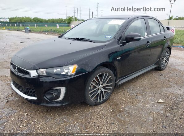 JA32U8FW6GU008824 2016 MITSUBISHI LANCER Black Vista tres cuartos delantera izquierda