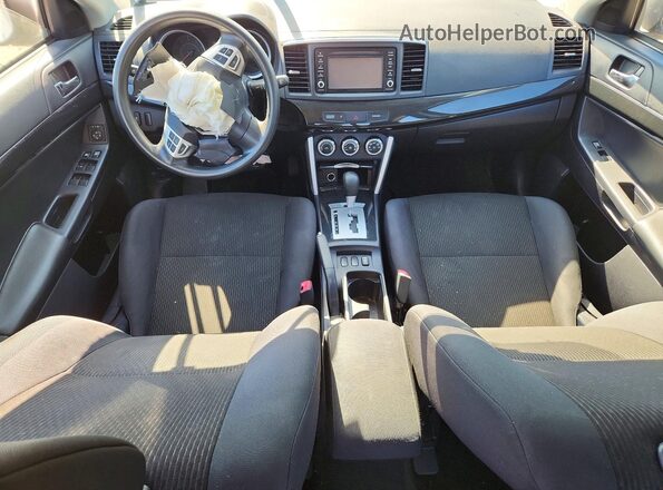 JA32V2FW2HU012879 2017 MITSUBISHI LANCER Серебряный Вид панели приборов
