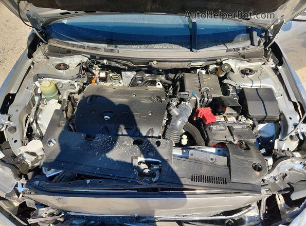 JA32V2FW2HU012879 2017 MITSUBISHI LANCER Серебряный Вид задней части салона