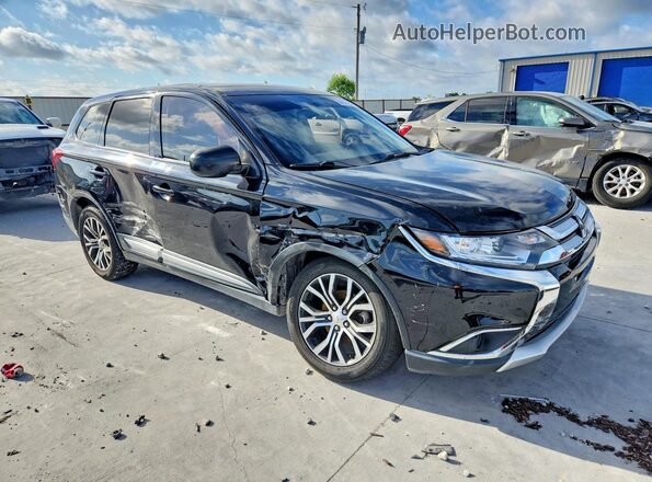 JA4AD2A3XJZ009695 2018 MITSUBISHI OUTLANDER Черный Передняя правая четверть