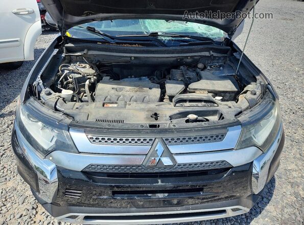 JA4AD3A34LZ005473 2020 MITSUBISHI OUTLANDER Gray Rear interior view