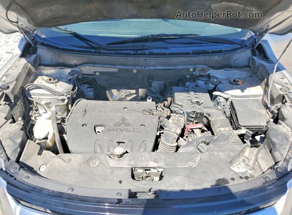JA4APVAU3MU019116 2021 MITSUBISHI OUTLANDER Silver Vista del compartimento del motor