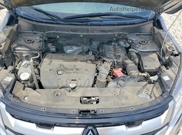 JA4APVAU7MU024657 2021 MITSUBISHI OUTLANDER Silver Vista del compartimento del motor