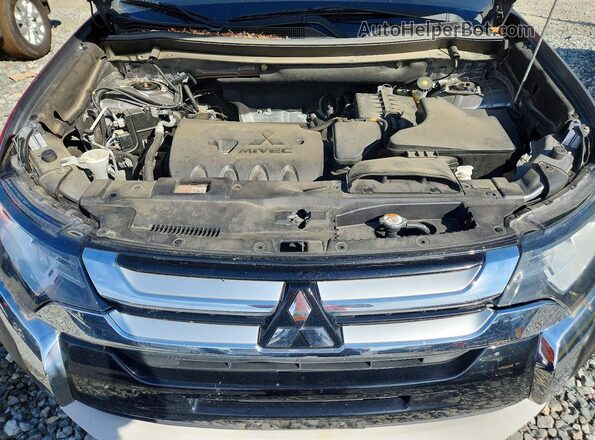 JA4AZ3A37JZ057176 2018 MITSUBISHI OUTLANDER Gray Vista del compartimento del motor