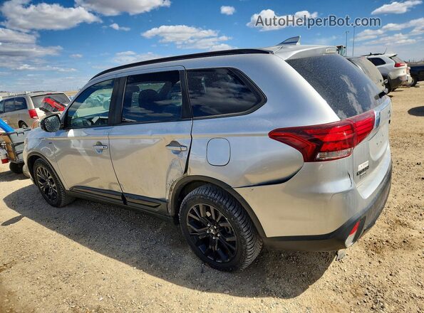 JA4JZ3AX3JZ606908 2018 MITSUBISHI OUTLANDER Silver Trasero izquierdo