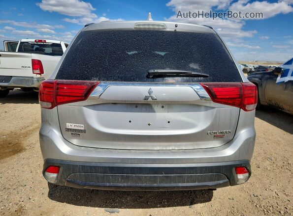 JA4JZ3AX3JZ606908 2018 MITSUBISHI OUTLANDER Silver Vista trasera