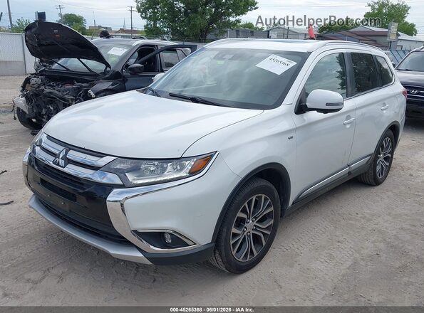 JA4JZ4AX6HZ039867 2017 MITSUBISHI OUTLANDER White Vista tres cuartos delantera izquierda