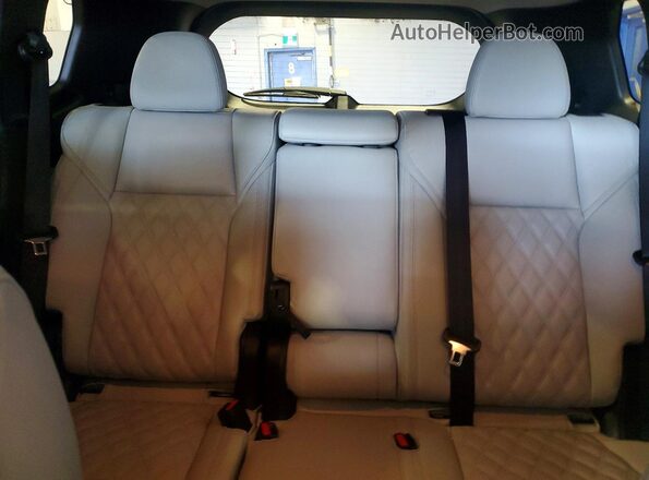 JA4T5VA95SZ601034 2025 MITSUBISHI OUTLANDER White Vista de los asientos traseros