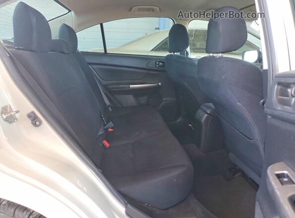 JF1GJAA67GH017626 2016 SUBARU IMPREZA White Vista de los asientos traseros