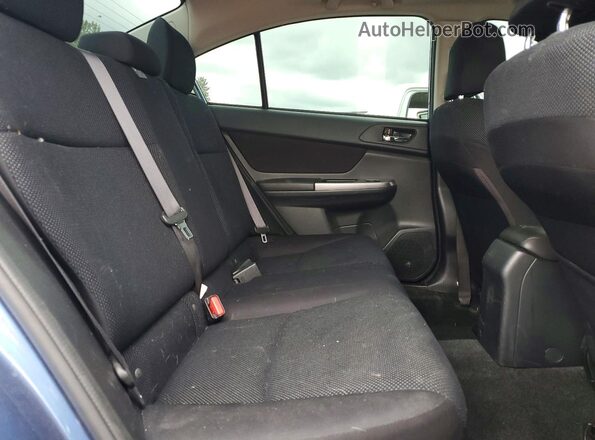 JF1GJAF69GH014011 2016 SUBARU IMPREZA Blue Rear seats view