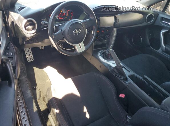 JF1ZNAA11G9701017 2016 TOYOTA SCION Black Առջևի վահանակի տեսք