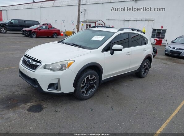 JF2GPADC7G8251115 2016 SUBARU CROSSTREK White Vista tres cuartos delantera izquierda