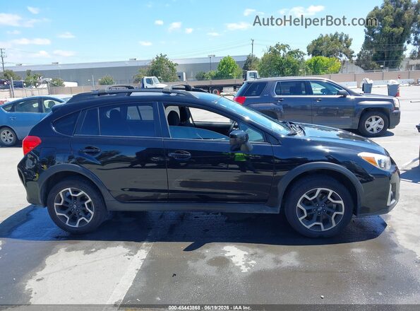 JF2GPADC8HH243025 2017 SUBARU CROSSTREK Black Rear interior view