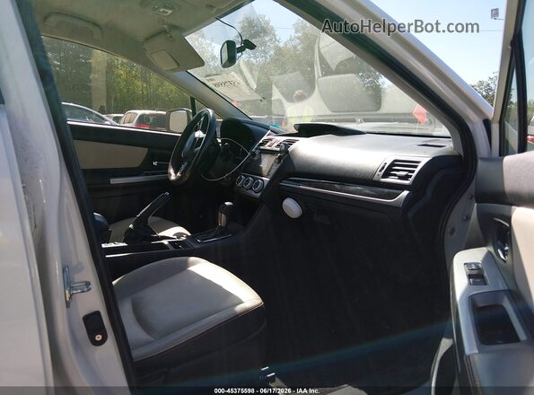 JF2GPAKC0G8225331 2016 SUBARU CROSSTREK White Front interior view
