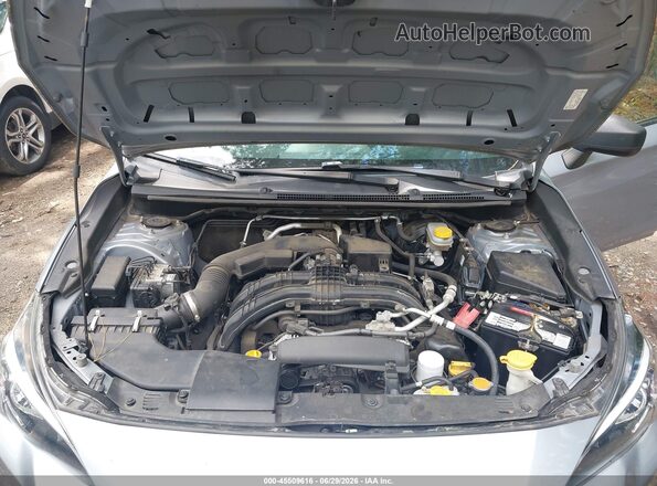 JF2GTAAC4JH208620 2018 SUBARU CROSSTREK Silver Rear view