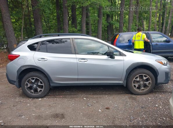 JF2GTAAC4JH208620 2018 SUBARU CROSSTREK Silver Rear interior view