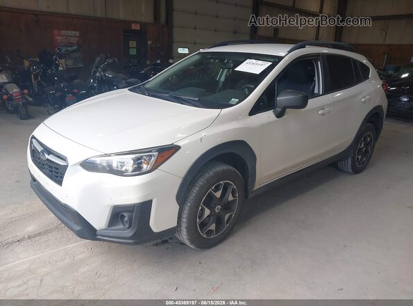 JF2GTAAC9JH314609 2018 SUBARU CROSSTREK White Vista tres cuartos delantera izquierda