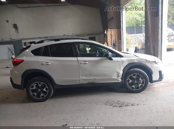 JF2GTAAC9JH314609 2018 SUBARU CROSSTREK White Vista interior trasera
