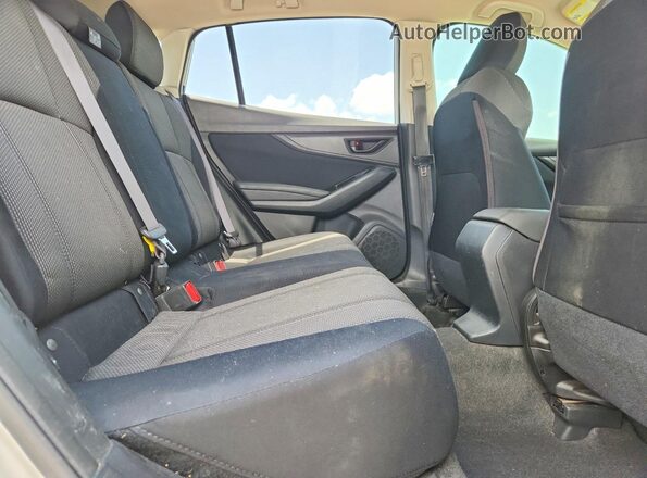 JF2GTAAC9K8240321 2019 SUBARU CROSSTREK White Rear interior view