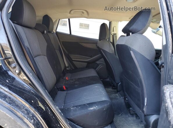 JF2GTAAC9M9214489 2021 SUBARU CROSSTREK Black Rear interior view