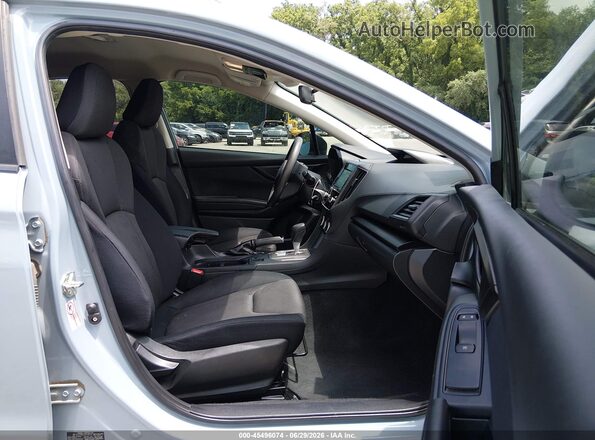 JF2GTABC2L8234537 2020 SUBARU CROSSTREK Light Blue Vista interior delantera