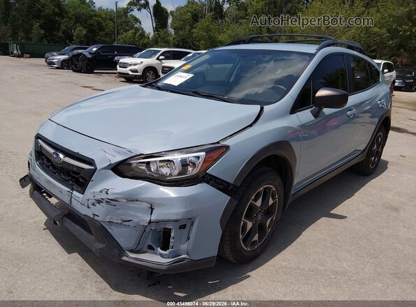 JF2GTABC2L8234537 2020 SUBARU CROSSTREK Light Blue Vista tres cuartos delantera izquierda