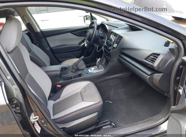 JF2GTABC4JH325581 2018 SUBARU CROSSTREK Black Front interior view
