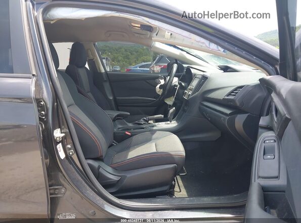 JF2GTACC7K8390215 2019 SUBARU CROSSTREK Black Front interior view