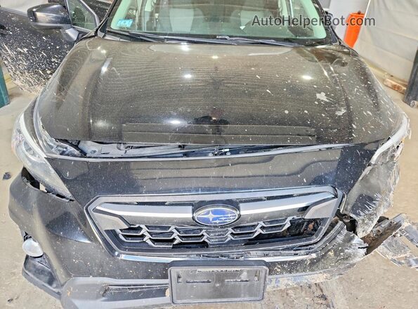 JF2GTADC0JH316065 2018 SUBARU CROSSTREK Black Rear interior view