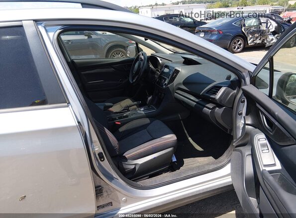 JF2GTADC1KH259229 2019 SUBARU CROSSTREK Серебряный Вид салона спереди